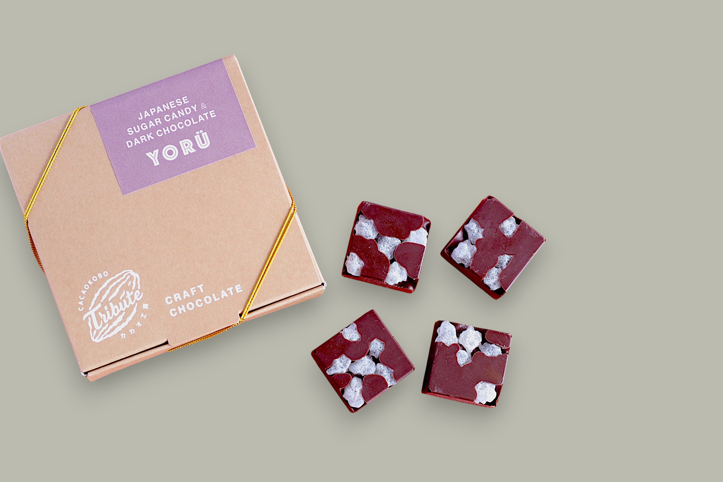 CACAOKOBO TRIBUTE Yorü Japanese Sugar Candy & Dark Chocolate squares with visible candy pieces.