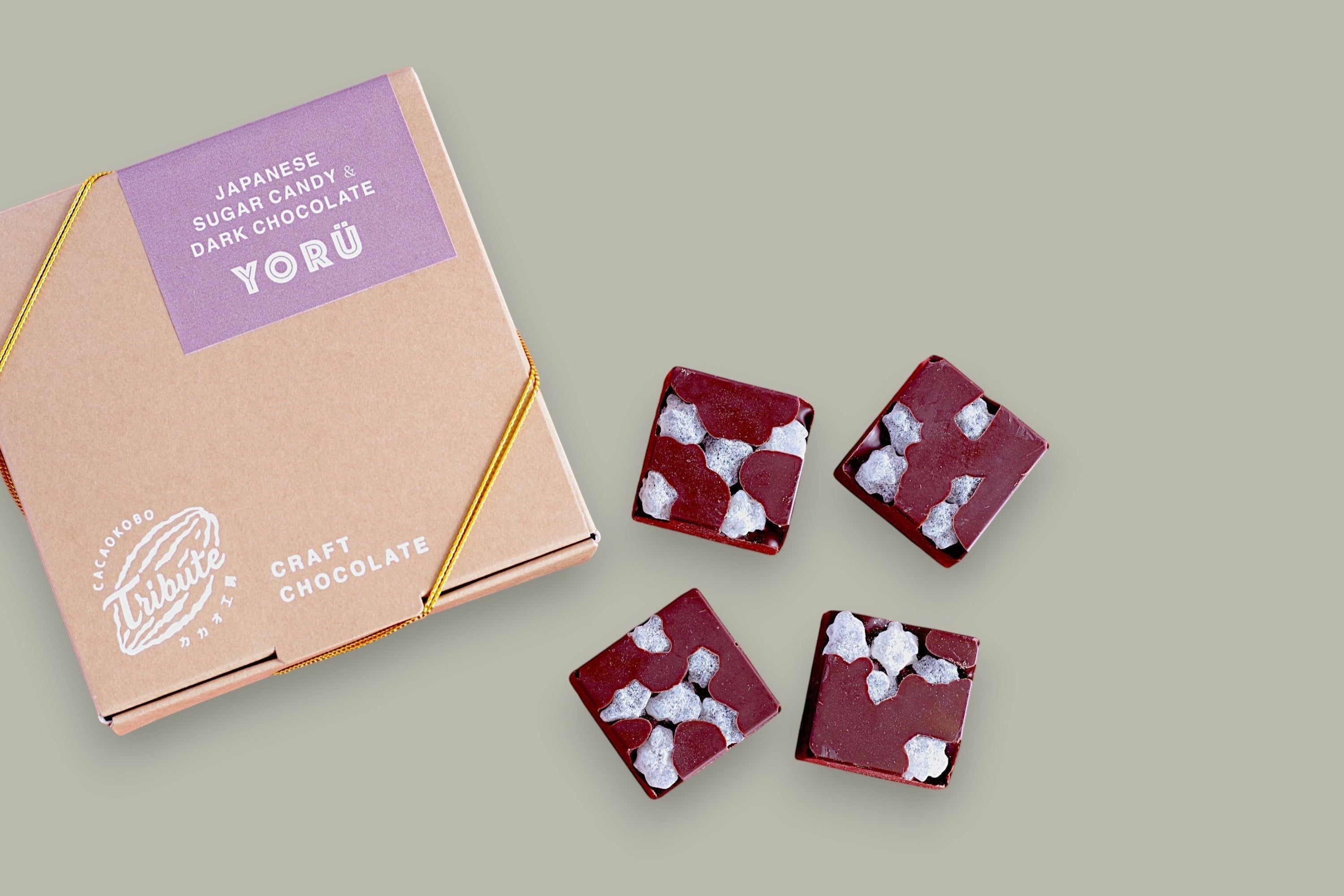 CACAOKOBO TRIBUTE Yorü Japanese Sugar Candy & Dark Chocolate squares with visible candy pieces.